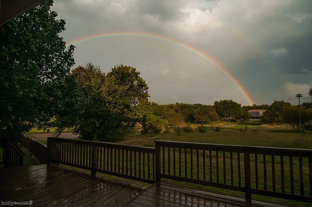 Austin landscape nature photographer storm sky rain clouds rainbow