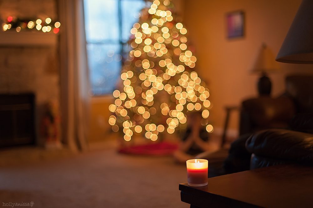 Austin photographer Christmas tree bokeh candle prayer