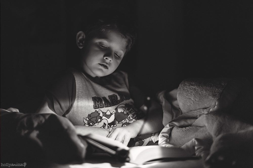 Austin lifestyle child boy black and white photographer read reading