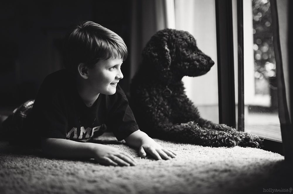 Austin lifestyle portrait boy child black and white photographer dog canine Labradoodle