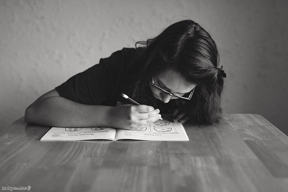Austin lifestyle child girl study workbook photographer black and white