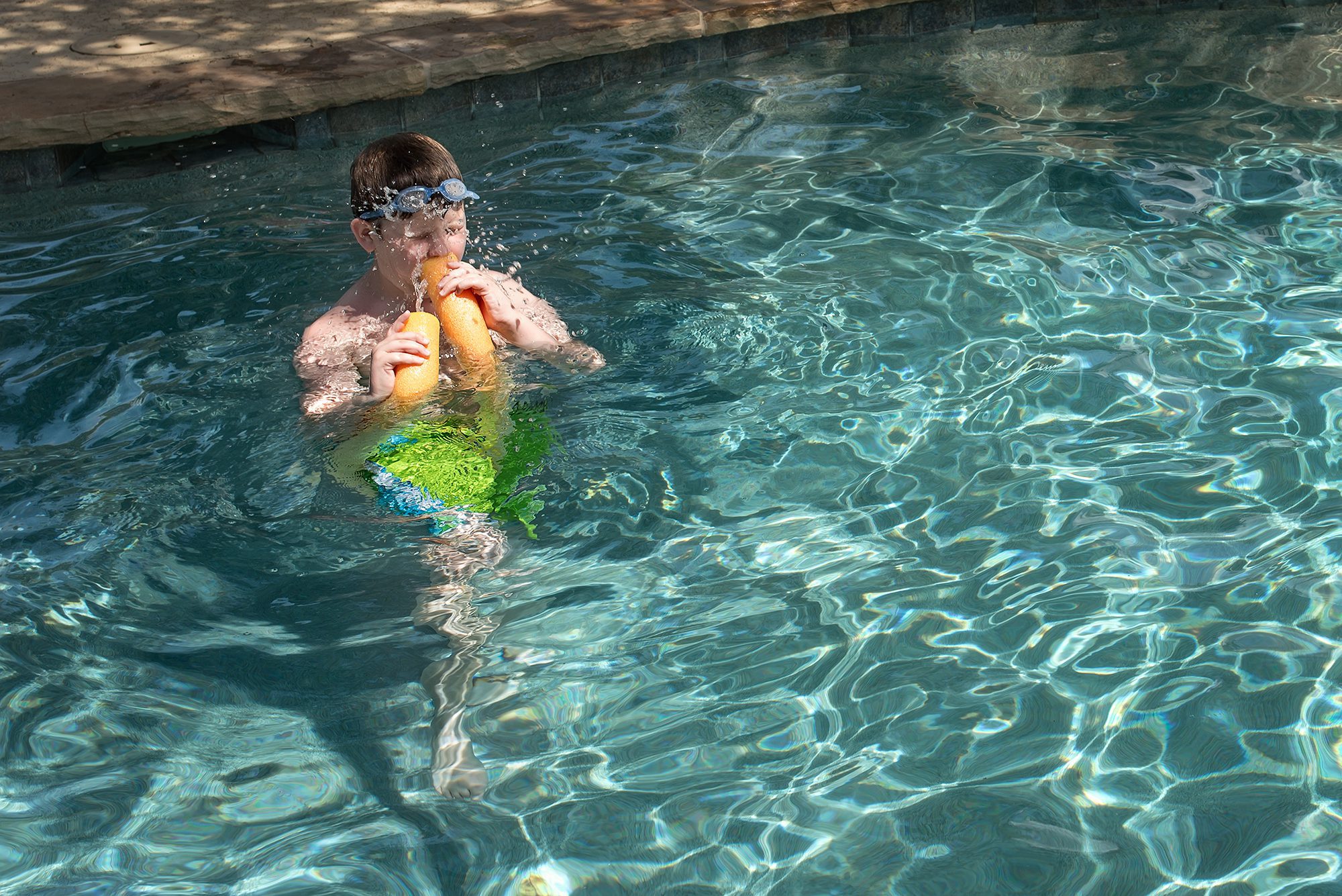 New Braunfels child boy pool swim photographer
