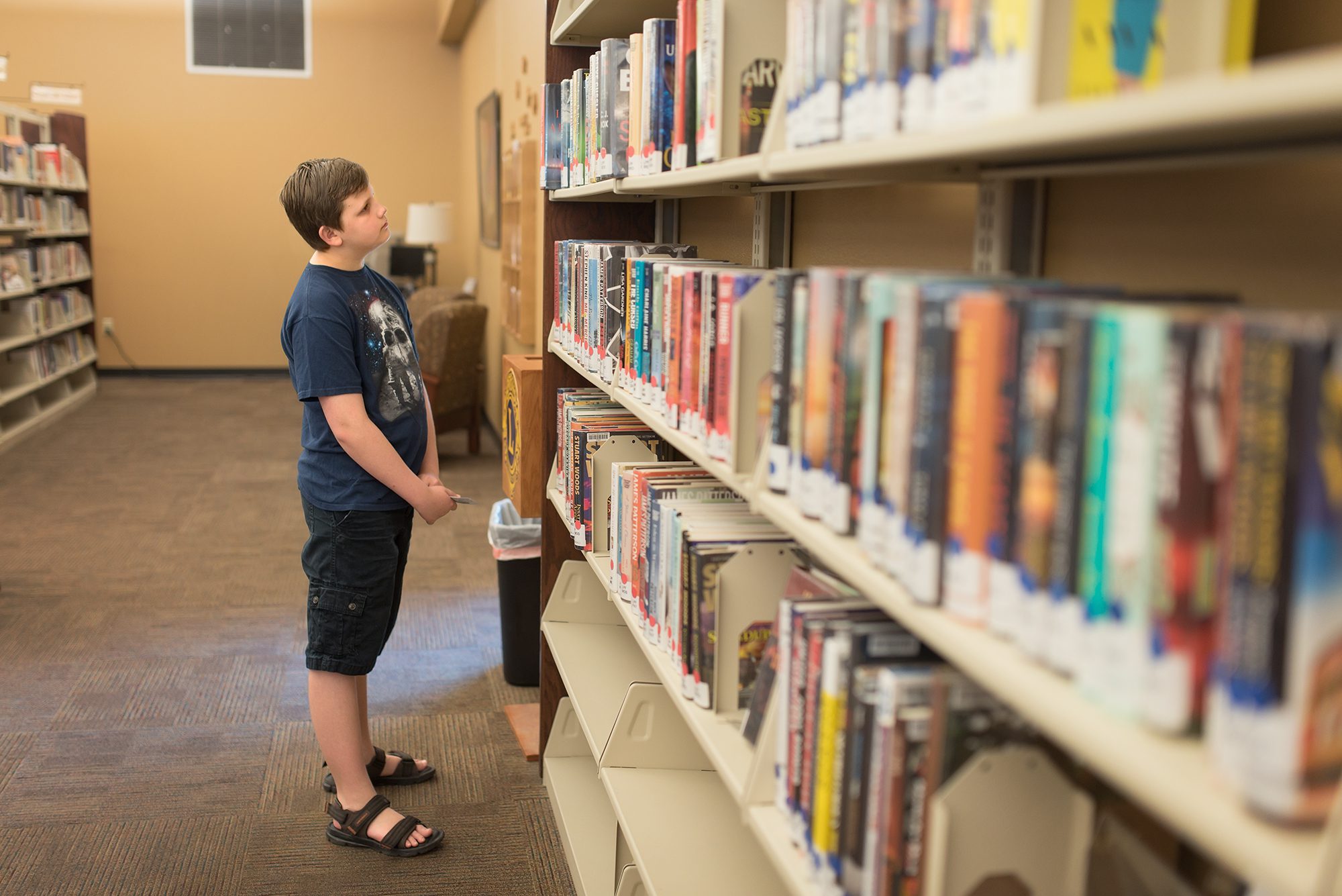 New Braunfels child boy library read photographer